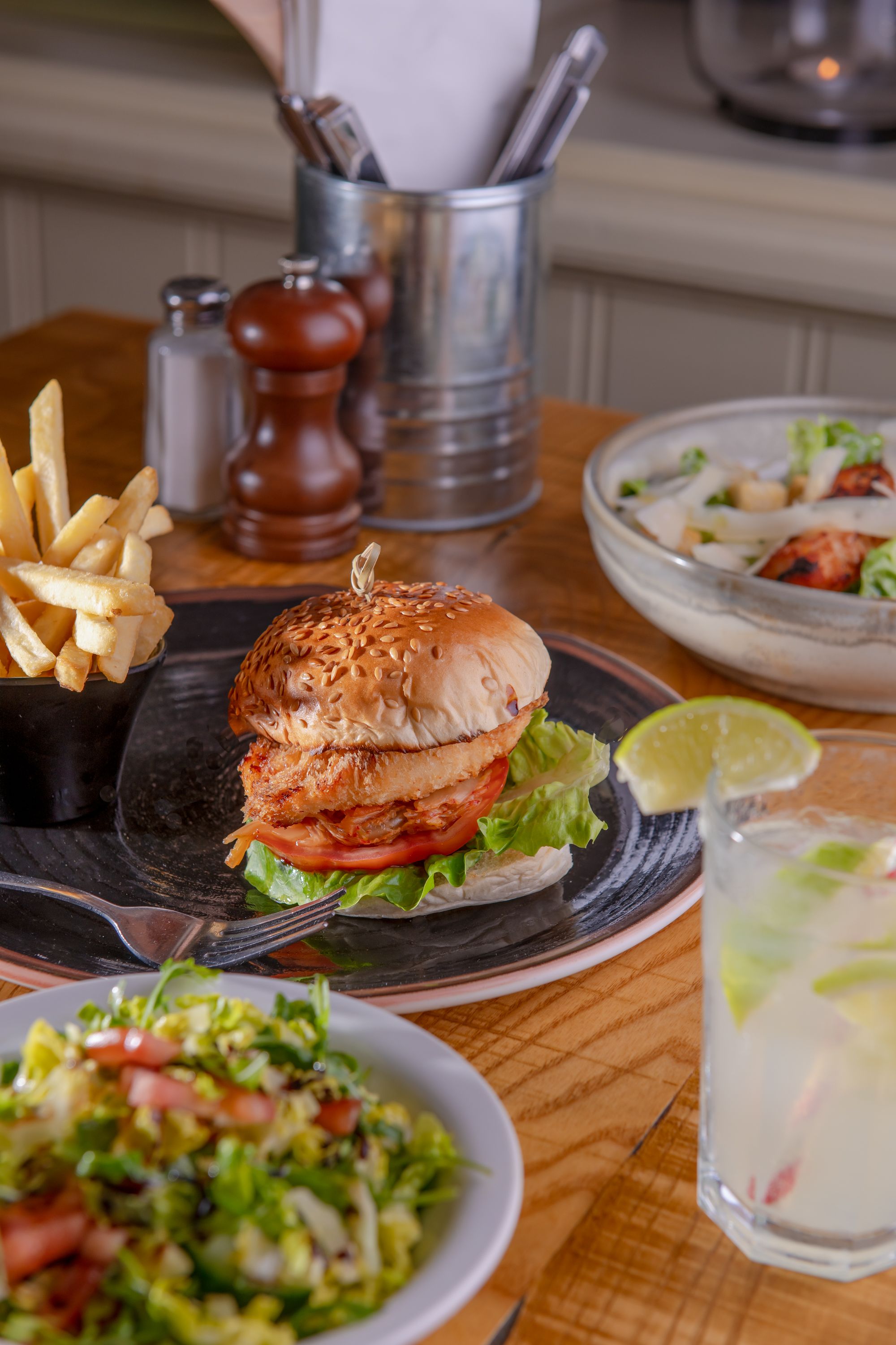 Burger, fries, salad and lemonade